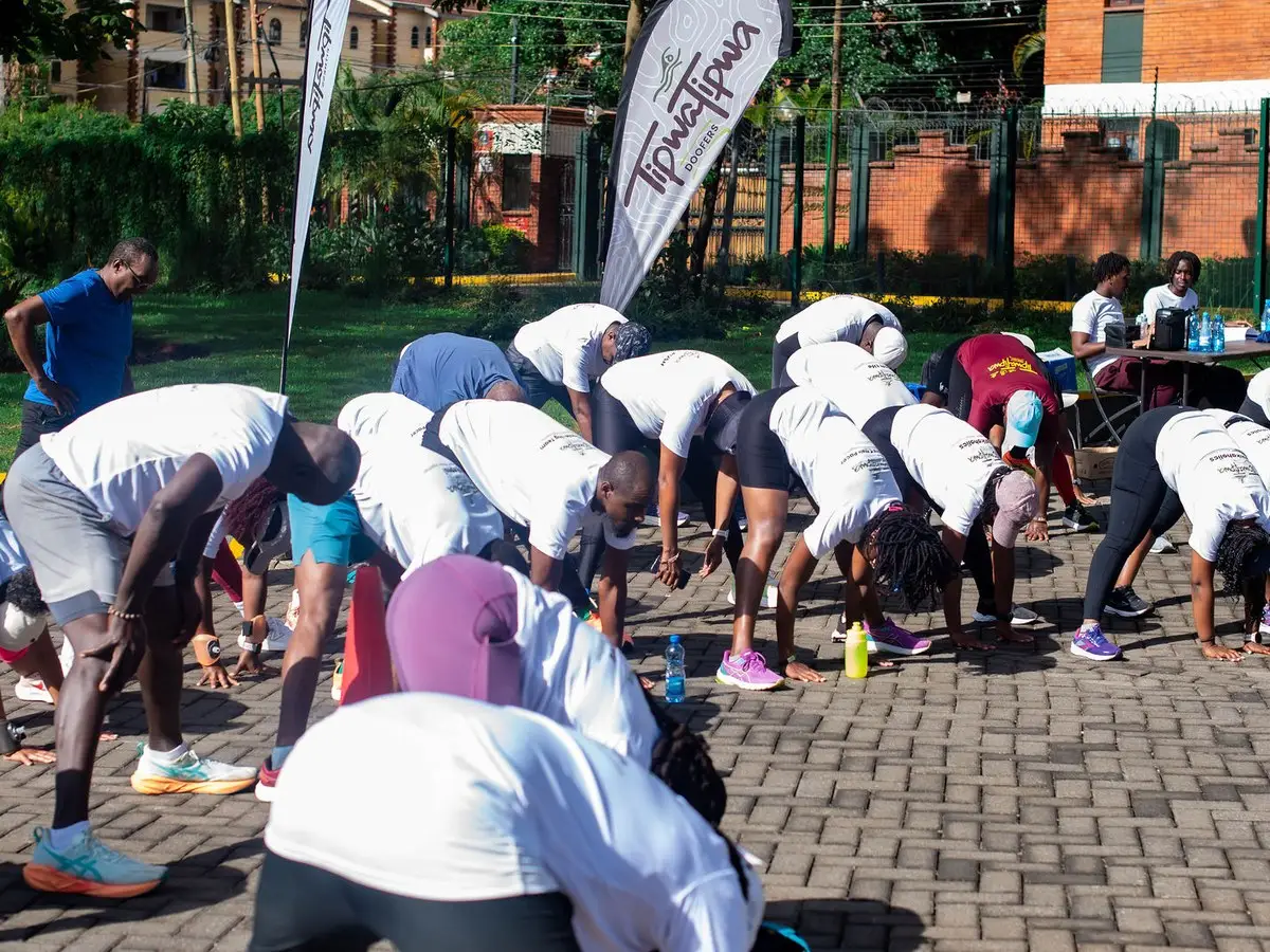 The group warming up together before the TipwaTipwa relay